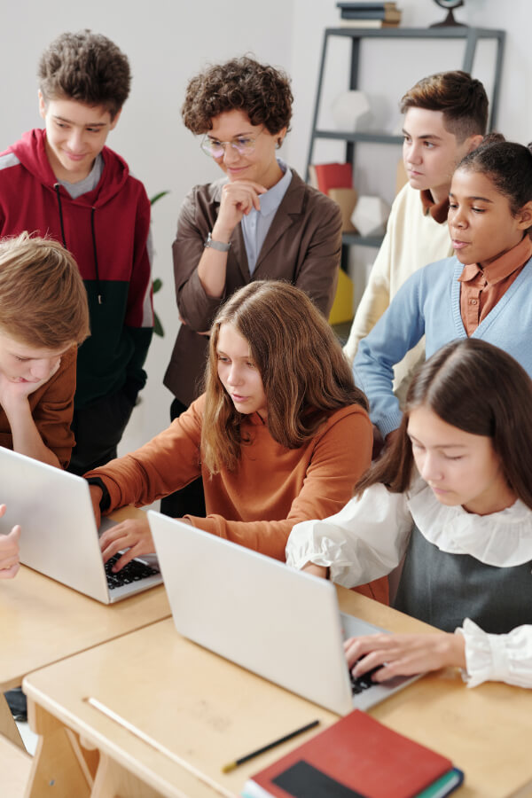 teacher with students support climate change activism